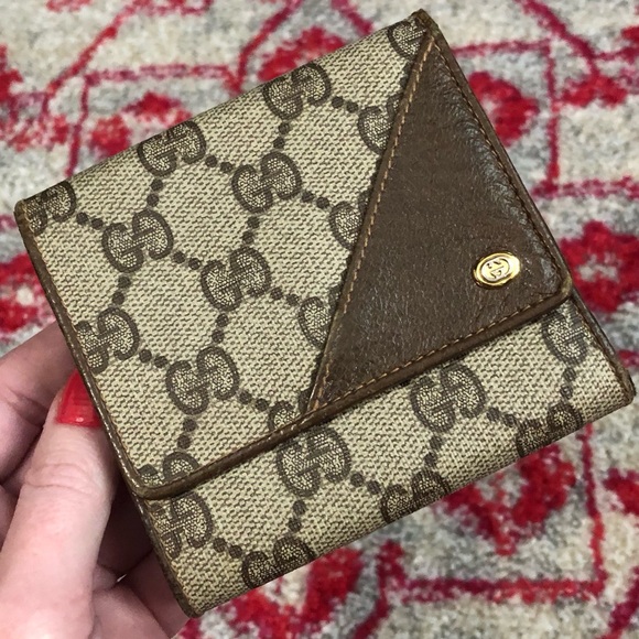 Gucci Handbags - Gucci AUTHENTIC Vintage Anniversary Collection Brown Logo GG Compact Wallet